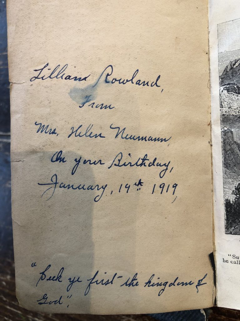 Inscription inside the Illustrated Bible. It reads "Lilian Rowland, From Mrs. Helen Nuemann. On your birthday, January 19th 1919, "seek ye first the kingdom of God." 