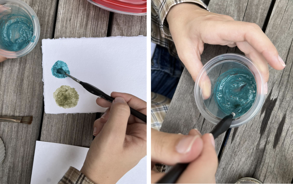 Left image: student's hand painting a circle of verdigris on parchment above a circle of green earth
Right image: student's hands mixing verdigris paint with a brush in a small container